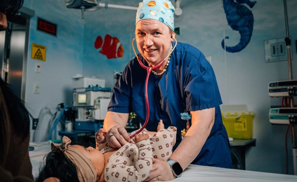 Anaesthetist with child