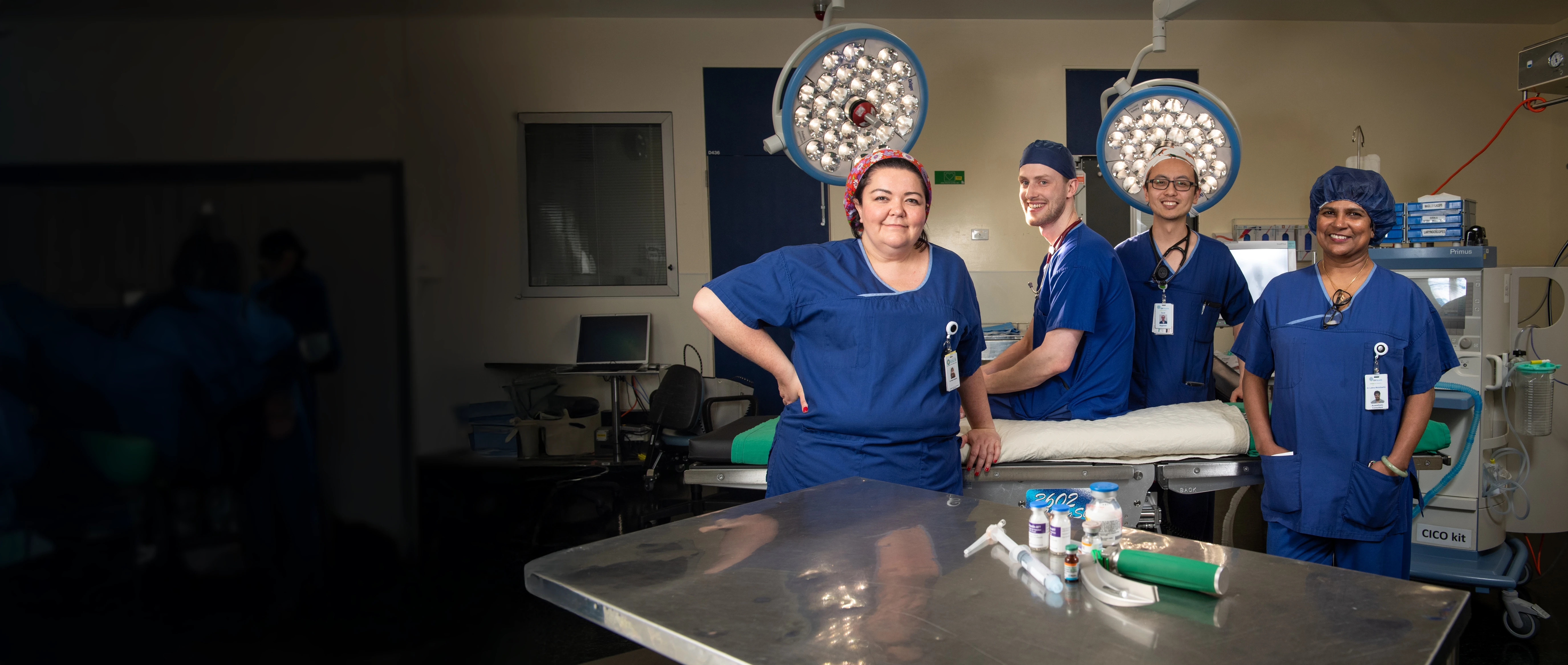 Four specialist anaesthetists in an operating theatre