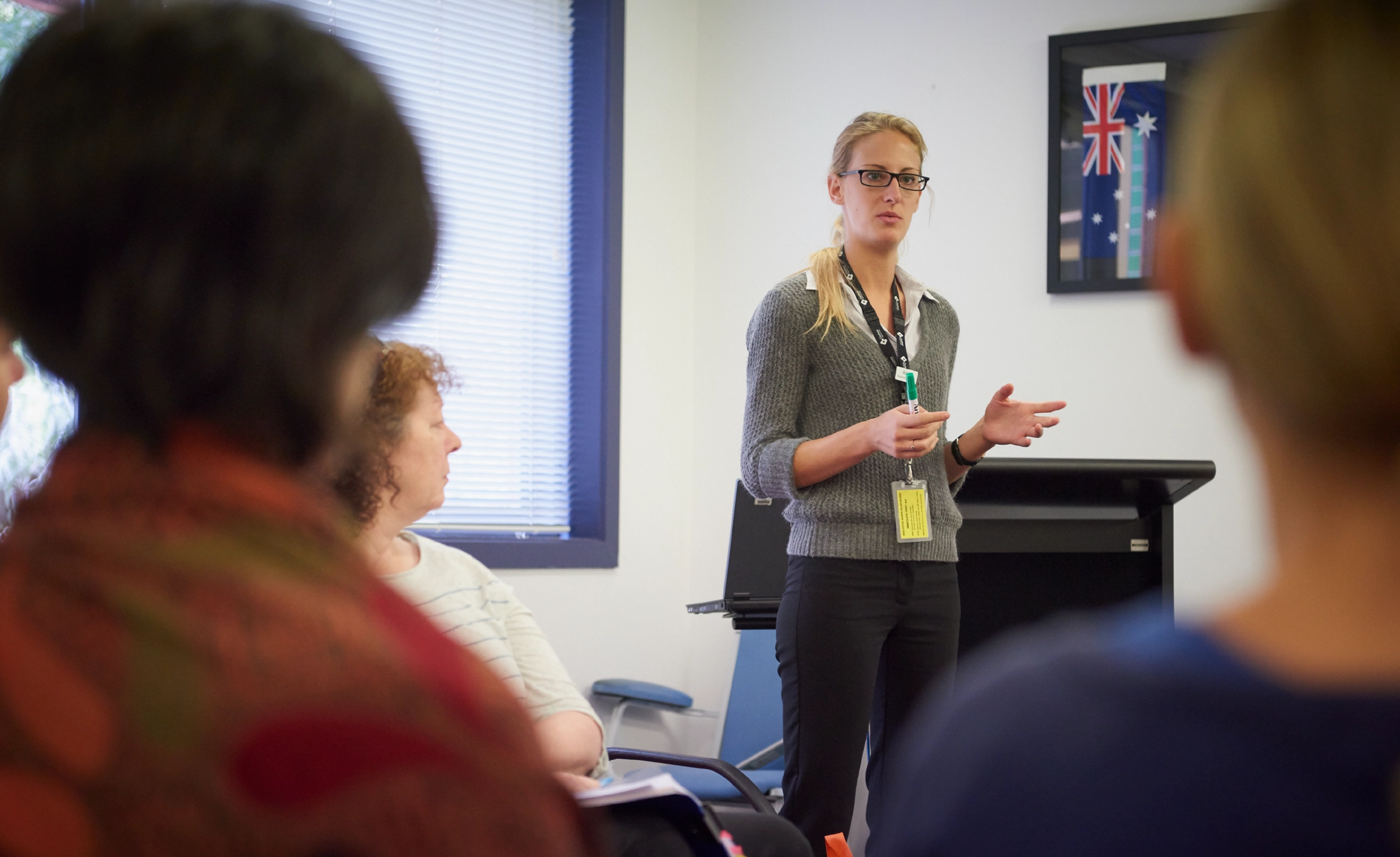 Person standing talking to audience